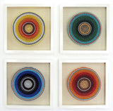 The Turning Year Edition 3 of 4, handcrafted 3D wall installation with four colorful circular artworks